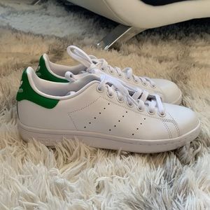 Women’s green and white adidas Stan Smith sneakers